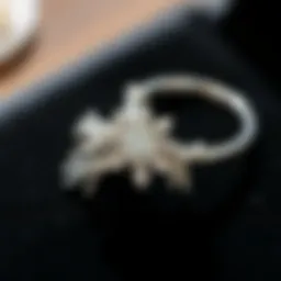 Polished silver jewelry on a black velvet surface