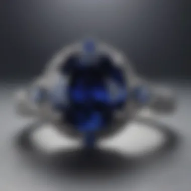 A well-maintained sapphire engagement ring resting on a soft fabric.