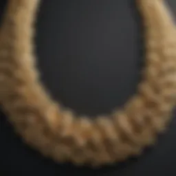 Close-up view of a gold necklace highlighting its texture and shine