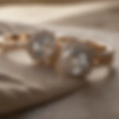 Elegant engagement ring set displayed on soft fabric