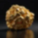 A close-up of a gold nugget on a dark background, emphasizing its natural beauty and rarity.