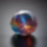 Close-up view of a vibrant faceted opal bead showcasing its unique colors