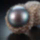 The iridescent luster of a variety of freshwater pearls showcased against a dark background.