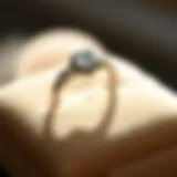 Showcasing the Beauty of a Diamond Ring Elegant diamond ring displayed on a soft cushion
