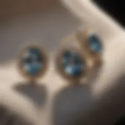 Elegant diamond earrings displayed on a plush fabric