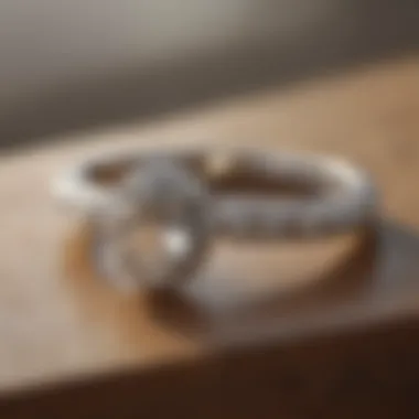 Timeless Elegance: Oval Bezel Set Engagement Ring Elegant oval bezel set engagement ring with sparkling diamonds