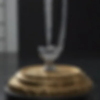 A close-up of a jewelry scale measuring carat total weight