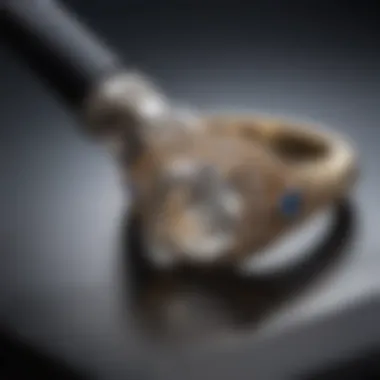 Close-up of an engagement ring being resized with a jeweler's tool